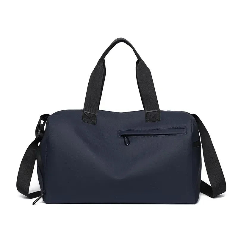 Navy blue duffel bag with black straps on a white background