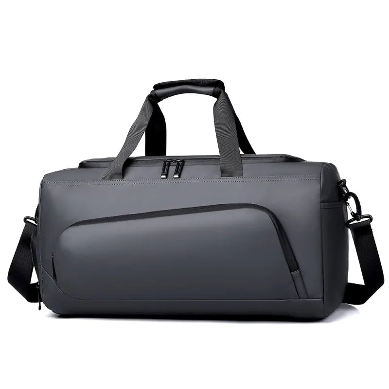 Gray duffel bag with black straps on a white background