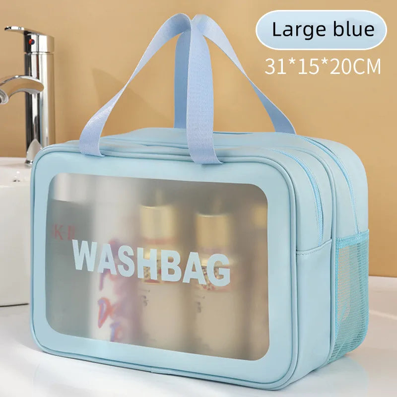 Blue washbag with clear window on a beige background